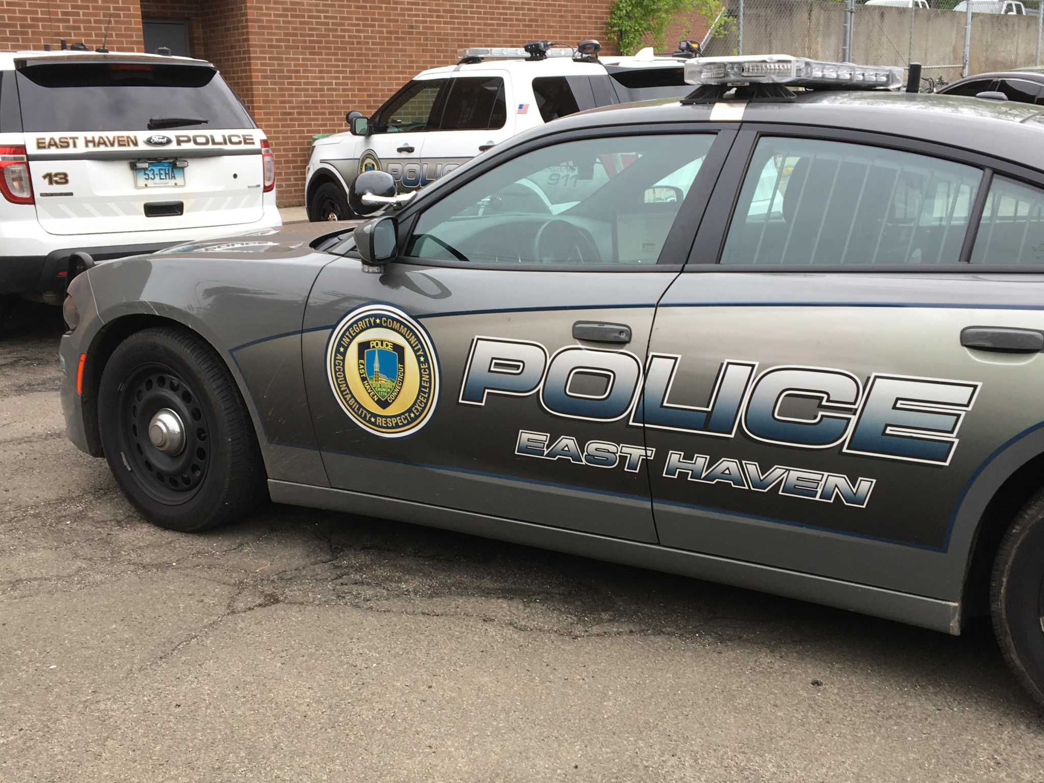 Motorist injured, faces charges after East Haven crash